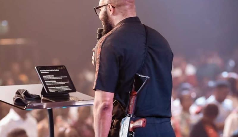 , wp contentuploads20230213224124Pastor with gun